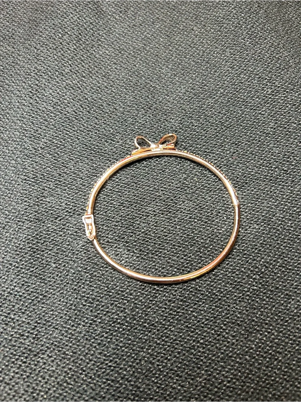 Kate Spade New York Gold-Tone Bow Bangle Bracelet with Crystal Accents - Picture 8 of 9